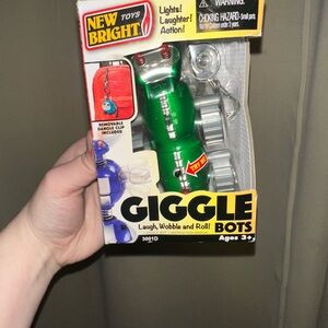 New Bright Giggle Bots Crazy Crawler toy keychain lights and sounds